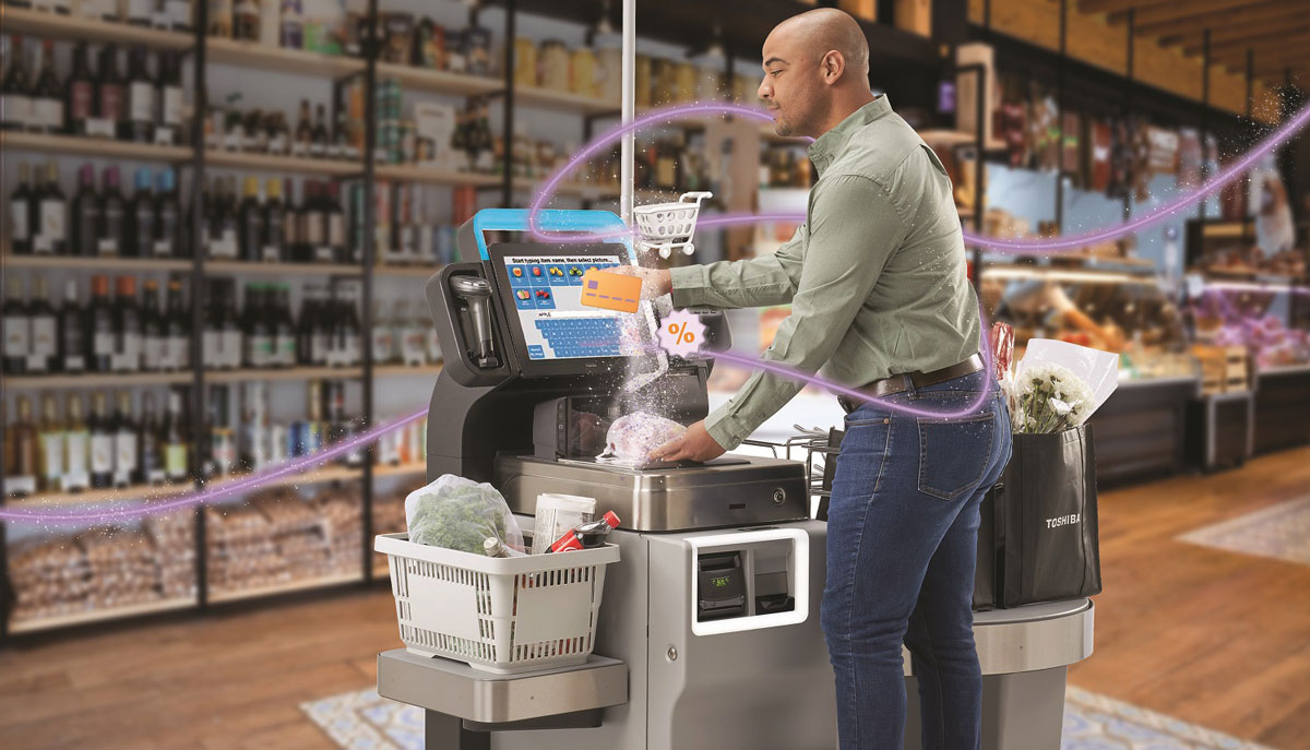 A man using a Toshiba system 7 self check out unit with a magical purple energy flying around him